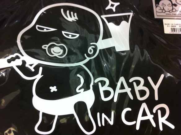 Baby [with axe] in car!